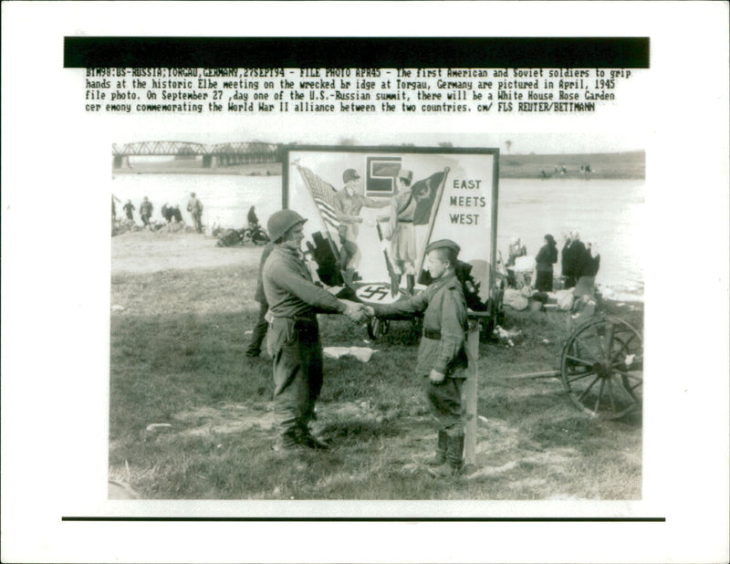 The first american and soviet soldier to grip hands. - Vintage Photograph