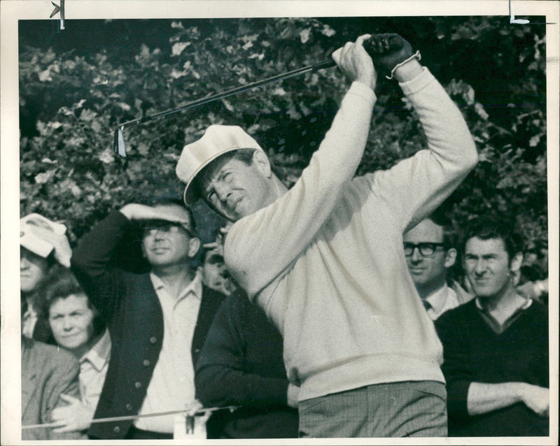 Gene Littler uses an iron - Vintage Photograph