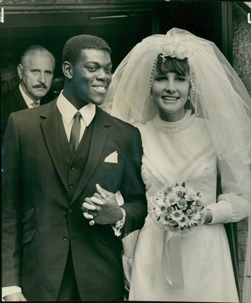 Norwell Roberts  with his bride former Miss Carolyn Rooke. - Vintage Photograph