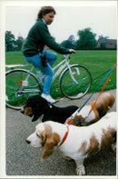 The owner and her dogs. - Vintage Photograph