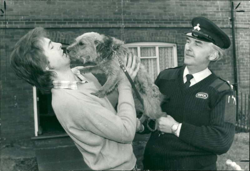 trapped terrier dog handed to his master - Vintage Photograph