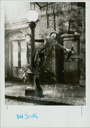 Gene Kelly in musical comedy film 'Singin' in the Rain' - Vintage Photograph