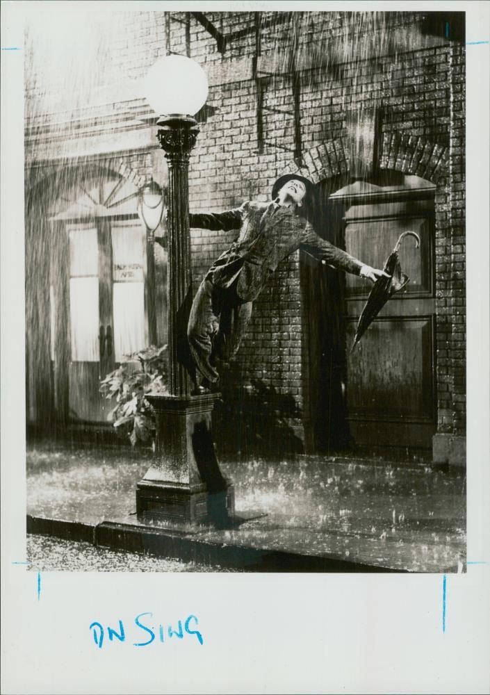 Gene Kelly in musical comedy film 'Singin' in the Rain' - Vintage Photograph