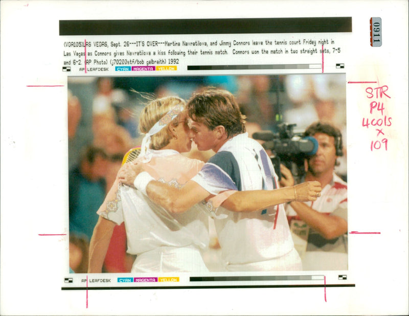 Jimmy Connors gives Martina Navratilova a kiss after match - Vintage Photograph