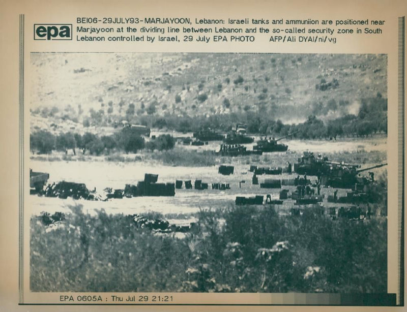 Israeli tanks and ammuniion are positioned near Marjayoon. - Vintage Photograph