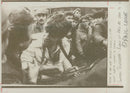 Apprehension and animation from a crowd gathered in bucharest as street fighting continues. - Vintage Photograph