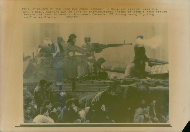 A romanian soldier uses his Tanks heavy machine gun to fire. - Vintage Photograph