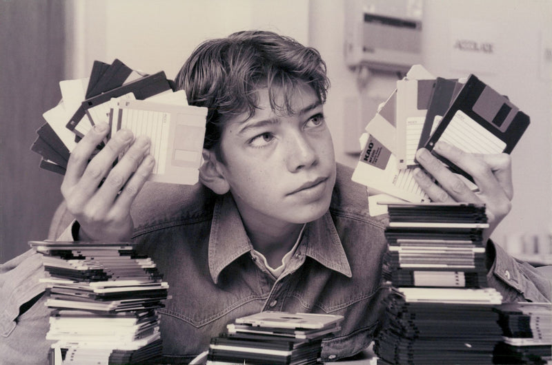 Illegal disks seized in a raid. - Vintage Photograph