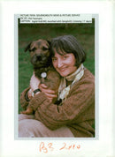 Dog with genghi. - Vintage Photograph