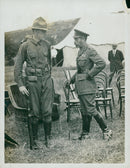 The two military soldiers is holding cane. - Vintage Photograph