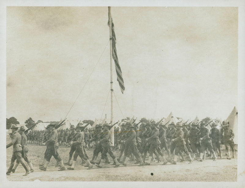 The military march on the field. - Vintage Photograph