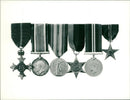A family group of medal. - Vintage Photograph