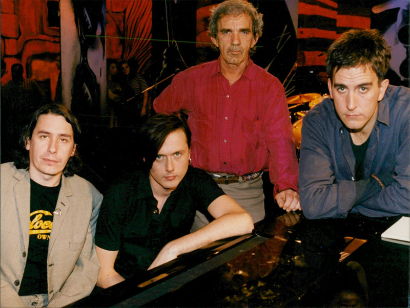 English pianist Jools Holland with fellow musicians - Vintage Photograph