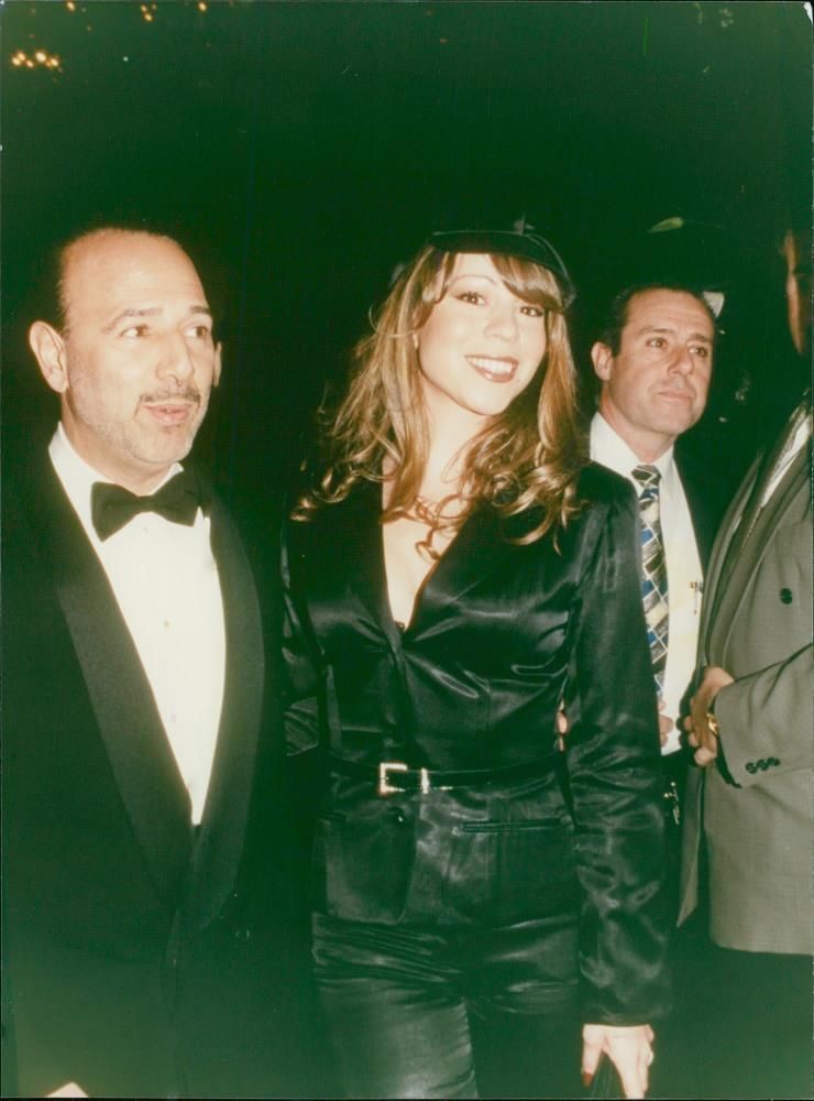 Mariah Carey  with her husband. - Vintage Photograph