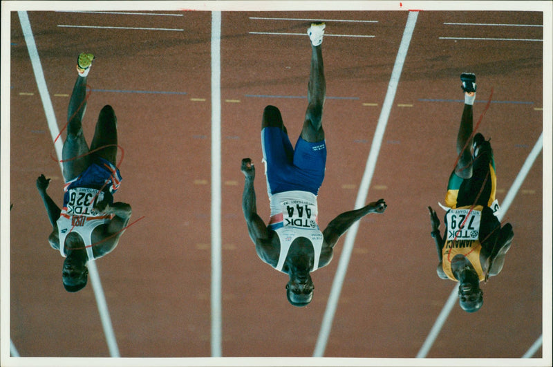 Linford Christie versus two other men. - Vintage Photograph