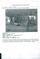 An Indian soldier guards the burnt out Muslim shrine - Vintage Photograph