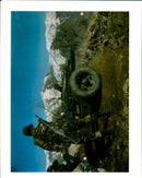 Turkish soldier wearing camouflage combat dress. - Vintage Photograph