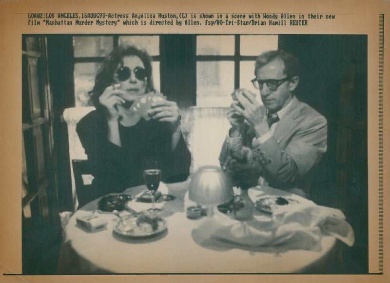 Woody Allen with actress Anjelica Huston in film 'Manhattan Murder Mystery' - Vintage Photograph