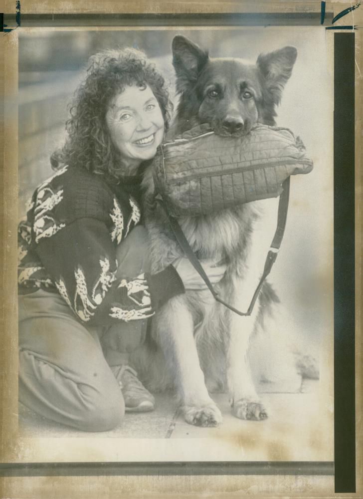alsatian dog with betty harris - Vintage Photograph