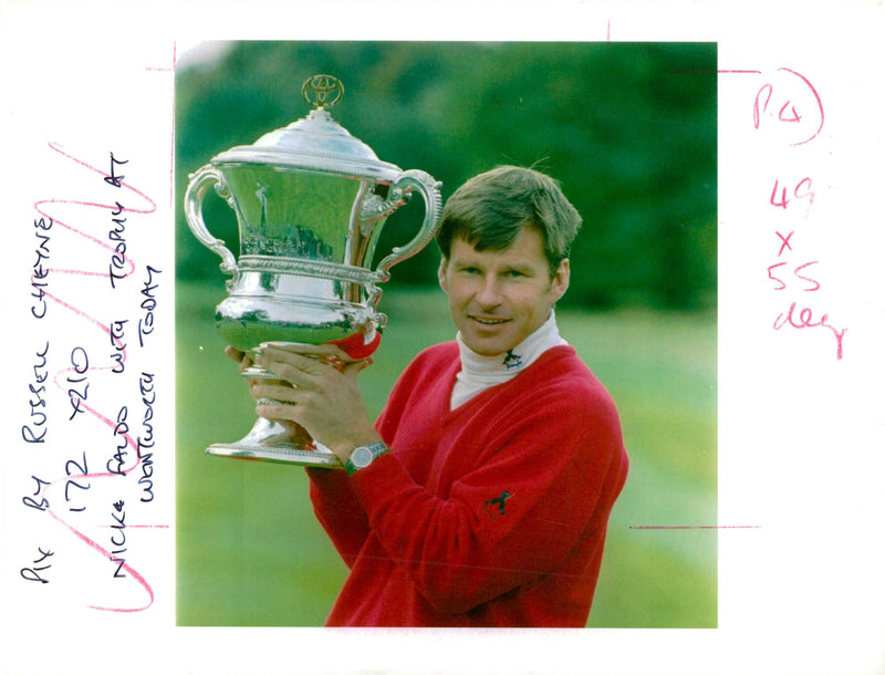 English golfer Nick Faldo with the championship trophy - Vintage Photograph