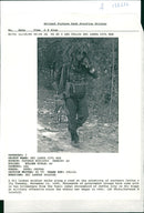 A Sri Lankan Soldier Walk's Along A Road. - Vintage Photograph