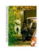 an irish soldier patrol near where the bomb with explosive. - Vintage Photograph