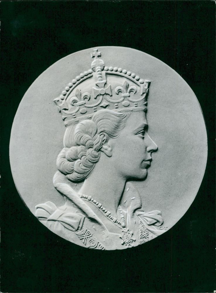 Elizabeth IIand the queen took a personal interest in the design of this coronation medal. - Vintage Photograph