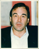 Oliver Stone American writer. - Vintage Photograph