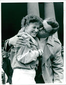 Alex Greaves is congratulated by Geoff Spink. - Vintage Photograph