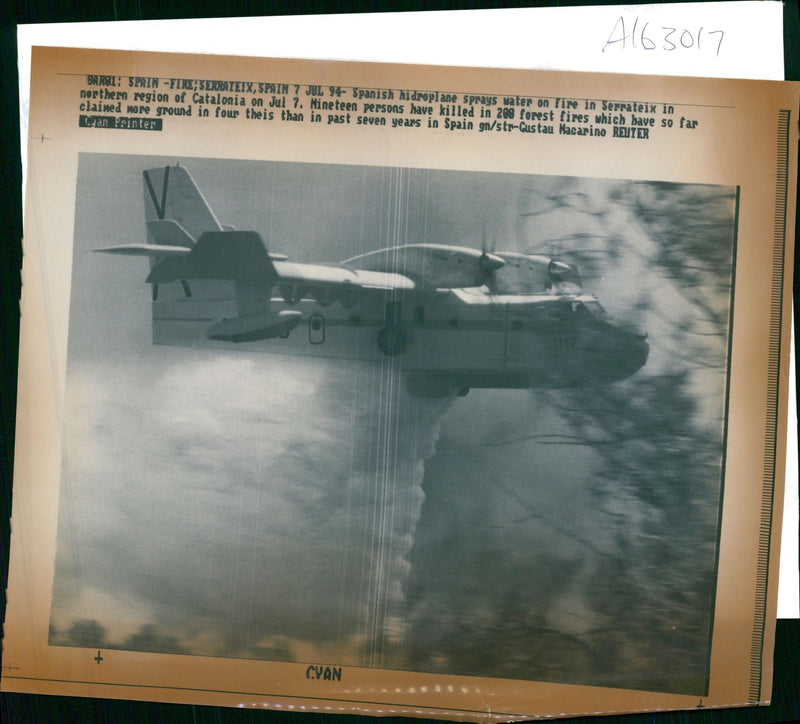 Spain fires and  spanish airplane spray water on fire in serrateix. - Vintage Photograph