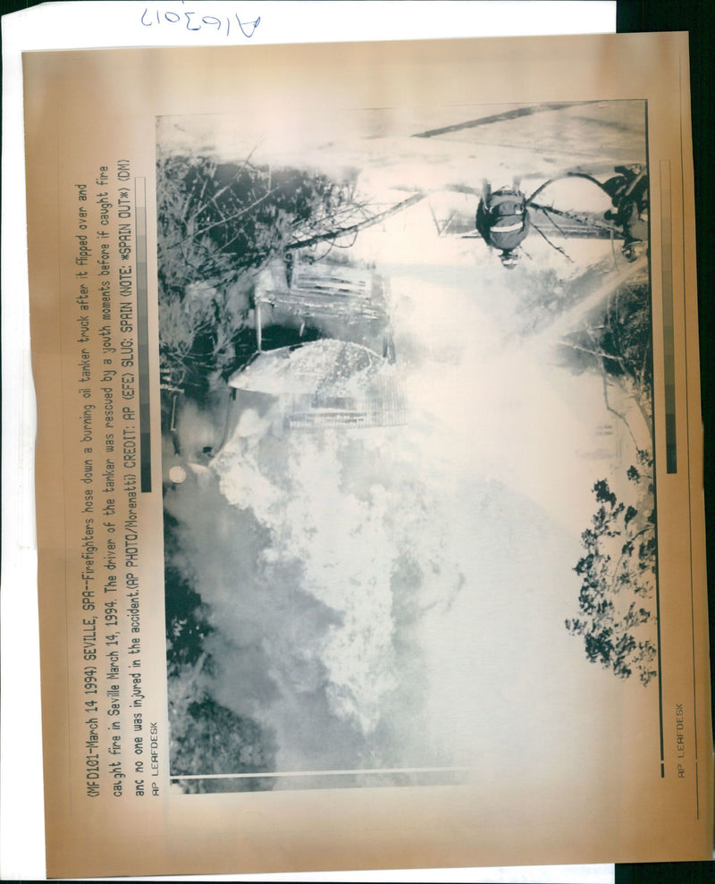 Spain fires and firefighter house down a burining oil tanker. - Vintage Photograph