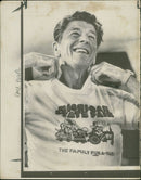 Ronald Reagan, Republican presidential candidate, wearing a Michigan State Fair shirt at a Campaign Barbeque lunch in Detroit. - Vintage Photograph