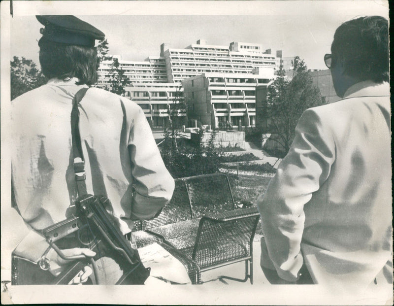 A policeman armed with a sub machine gun and a detective. - Vintage Photograph