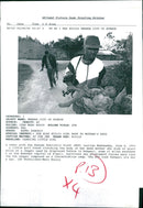 Rwandan Civil War:A little girl found clutching. - Vintage Photograph