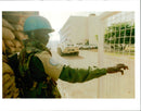 Rwanda war:a un peacekeeper watches the street in kigali. - Vintage Photograph
