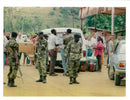 Rwanda war:soldier from the rwandan army check refugees leaving. - Vintage Photograph