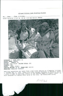 Shelling casualties are taken from a Red Cross vehicle to a hospital. - Vintage Photograph