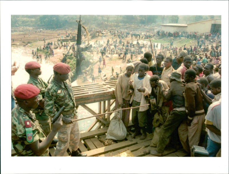 Zairan soldiers shoot in the air  Sunday. - Vintage Photograph