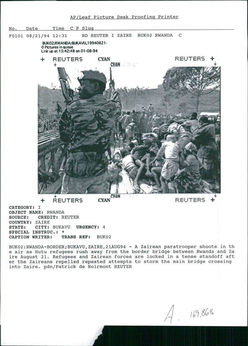 A Zairean paratrooper shoots in the air. - Vintage Photograph