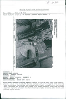 A little Hutu girl sits tensely within a crowd of some 10,000 Rwandan refugees. - Vintage Photograph