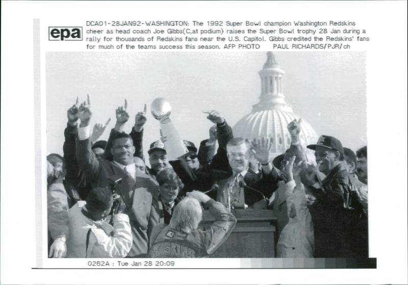 Headcoach Joe Gibbs Raises the Super Bowl Champion Trophy - Vintage Photograph