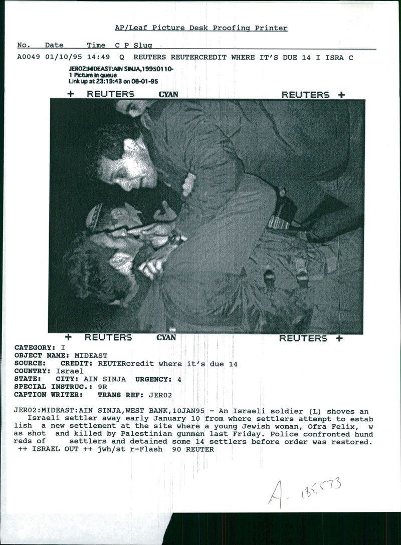 West Bank:An Israeli soldier shoves a Israeli settler. - Vintage Photograph