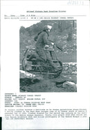West Bank:An Israeli soldier hurdles a barricade. - Vintage Photograph