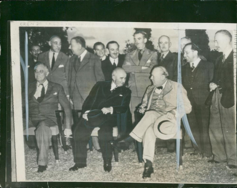The First picture received by radio last night of Mr churchill and president roosevelt at their meeting with president Ineunu of Turkey. - Vintage Photograph