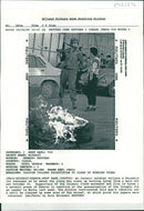 West Bank (Hebron):An Israeli soldier collars a Palestinian teenager. - Vintage Photograph