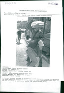 West Bank (Hebron):An Israeli soldier strikes a Palestinian youth. - Vintage Photograph