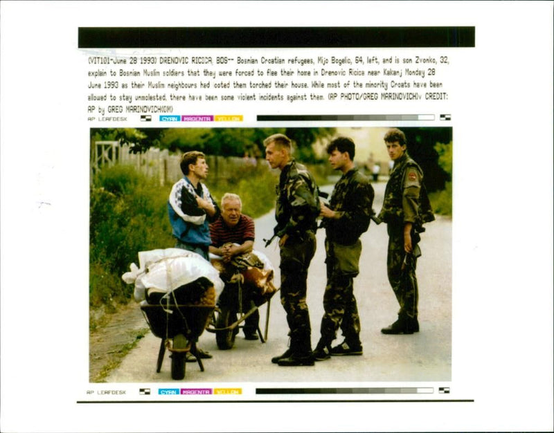 Yuedslavia Refugees:Mijo bogelic with the bosnian soldier. - Vintage Photograph