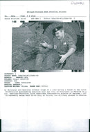 Ukraine: A Ukrainian and an American soldier. - Vintage Photograph