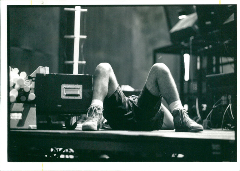 A bee gees roadle sleeps while 12500 party at their wembley concert. - Vintage Photograph