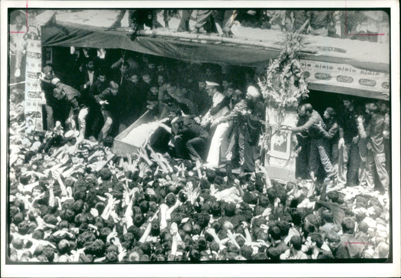 After the funeral frenzy in which Ruhollah Khomeini's body toppled into the crowd. - Vintage Photograph